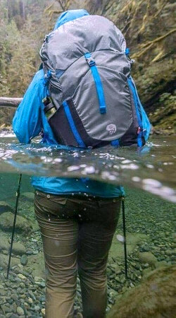 water hiking and swimming with a backpack