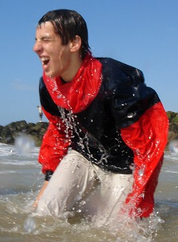 hooded anorak in the sea