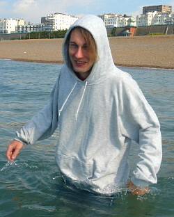 swimming in clothes at work on the beach