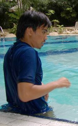 swimming teacher in clothes